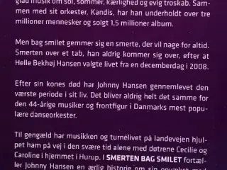Smerten bag smilet af Johnny Hansen