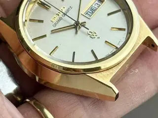 Seiko Grand Quartz Day/Date Cap Gold .
