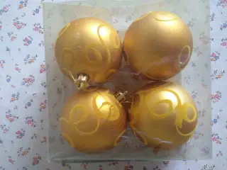 Gamle guld julekugler med mønster