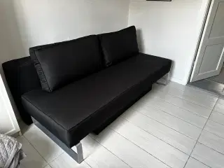 Sovesofa sort stof med opbevaring model Cama