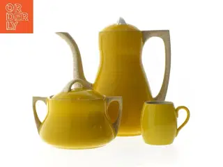 Gult kaffestel i keramik (str. 22, ø 12, 7 cm)