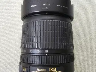 Nikon D7000 + AF-S 18-105 VR (DSLR) + Nikon AF-S N