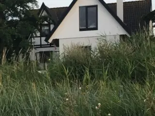 Strandhus i 1. r�kke til Neksel� Bugten