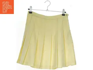 Gul plisseret nederdel fra H&M (str. 158)