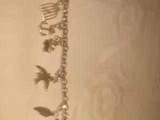 SØLVARMBÅND m/ 9 STK VEDHÆNG, SMUKT OG SPÆNDENDE, 