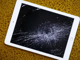 iPad reparation mens du venter