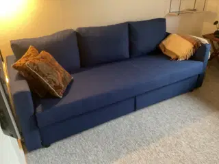 Dobbelt sovesofa i blå stof