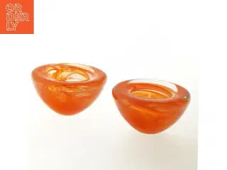 To klassiske orange glaslysestager fra Holmegaard (str. Ø 11x6 cm)