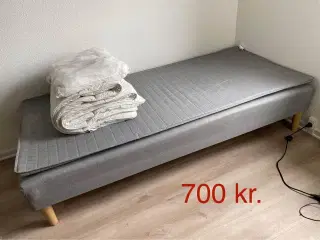 IKEA bed with duvet and pillow