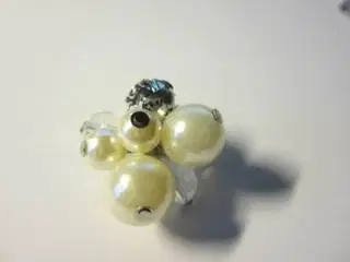 ring med perler