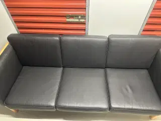 Sofa i sort skind 