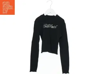 Langærmet sort bluse med tekst fra H&M (str. 140)