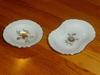 2 små askebæger med brun blomst