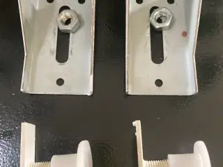 Beslag for radiator ophæng