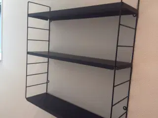 Hylde i sort metal