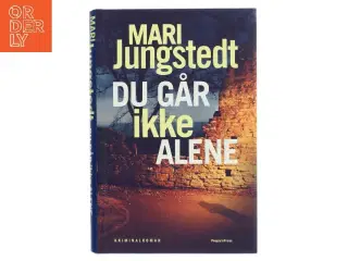 Du går ikke alene : kriminalroman af Mari Jungstedt (Bog)