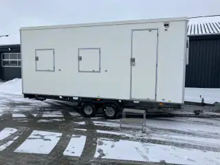 Kontorvogn med toilet og lille tee køkken.