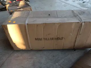 Mini tiller head