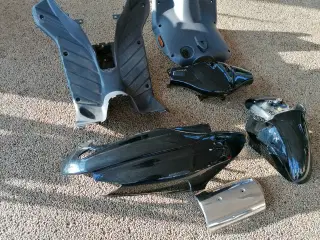 Brugte sorte skjolde Derbi Anlantis scooter. Se%