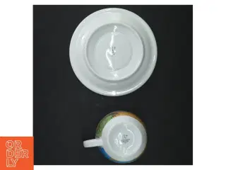 Dekoreret cappuccino kop og underkop fra D’Anc&#224;r (str. Y, 14,5 cm. h 6,5 cm, ø 8,5 cm)