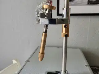 Faceting machine arm
