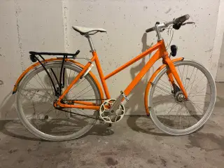 Citybike, orange med 7 indvendige gear