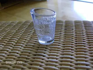 Charmerende målglas 