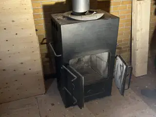 Brændeovn der skal nedtages i forbindelse 