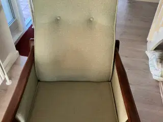 Otiumstol med stofbetræk.