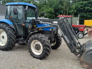 New Holland TD90D med frontlæsser (Eurobeslag)