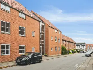 Passiv investering på populær beliggenhed: Ejerlejlighed i Kolding med stabil lejer og enklest mulig administration