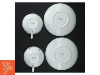 Juleinspirerede tekopper med underkopper fra Royal Copenhagen (str. Ø. 16,5 cm. h 6,5 ø. 10,5 cm)