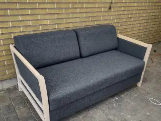 Sovesofa kan afhentes gratis 