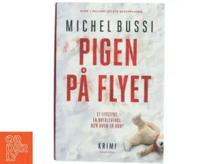 Pigen på flyet : krimi af Michel Bussi (f. 1965) (Bog)