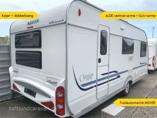 2009 - Adria Classica 543 PK   Alde centralvarme + el gulvvarme, KØJER + DOBBELTSENG, MOVER, 6 sovepladser VELHOLDT.