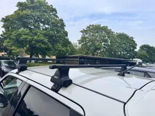 UDLEJES -THULE tagbøjler - passer til Nissan Juke.