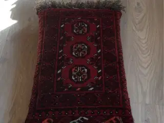 Puf af ægte tæppe med to sider