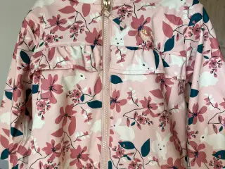Rosa regnfrakke fra Petits Chérie, str. 110