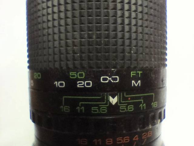 Optik 135mm med 42mm gevind. 